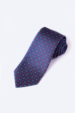 White And Red Spotted Square Design On Navy Tie