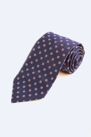 Pink outline with blue dots on navy tie
